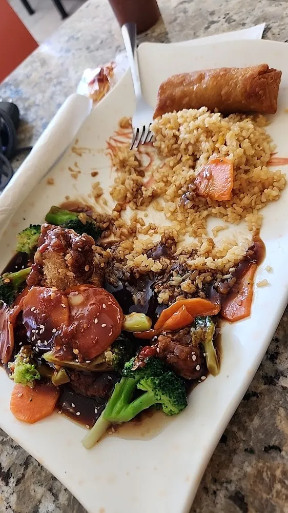 Sesame Chicken with Sliced Carrots and Broccoli